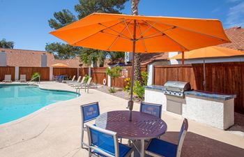 Grill and Lounge Area at Orange Tree Village Apartments